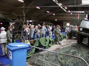 Het publiek kijkt naar het videoscherm